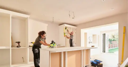 Kitchen renovation in progress, with wirings exposed